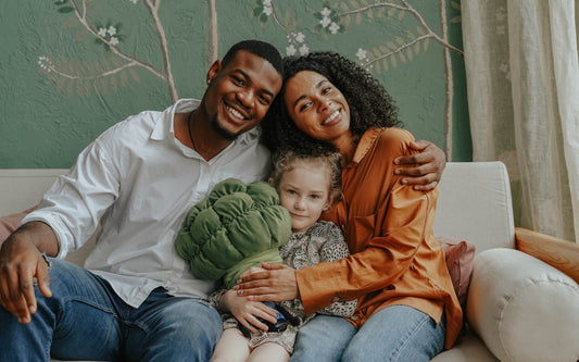 Black Family hugging