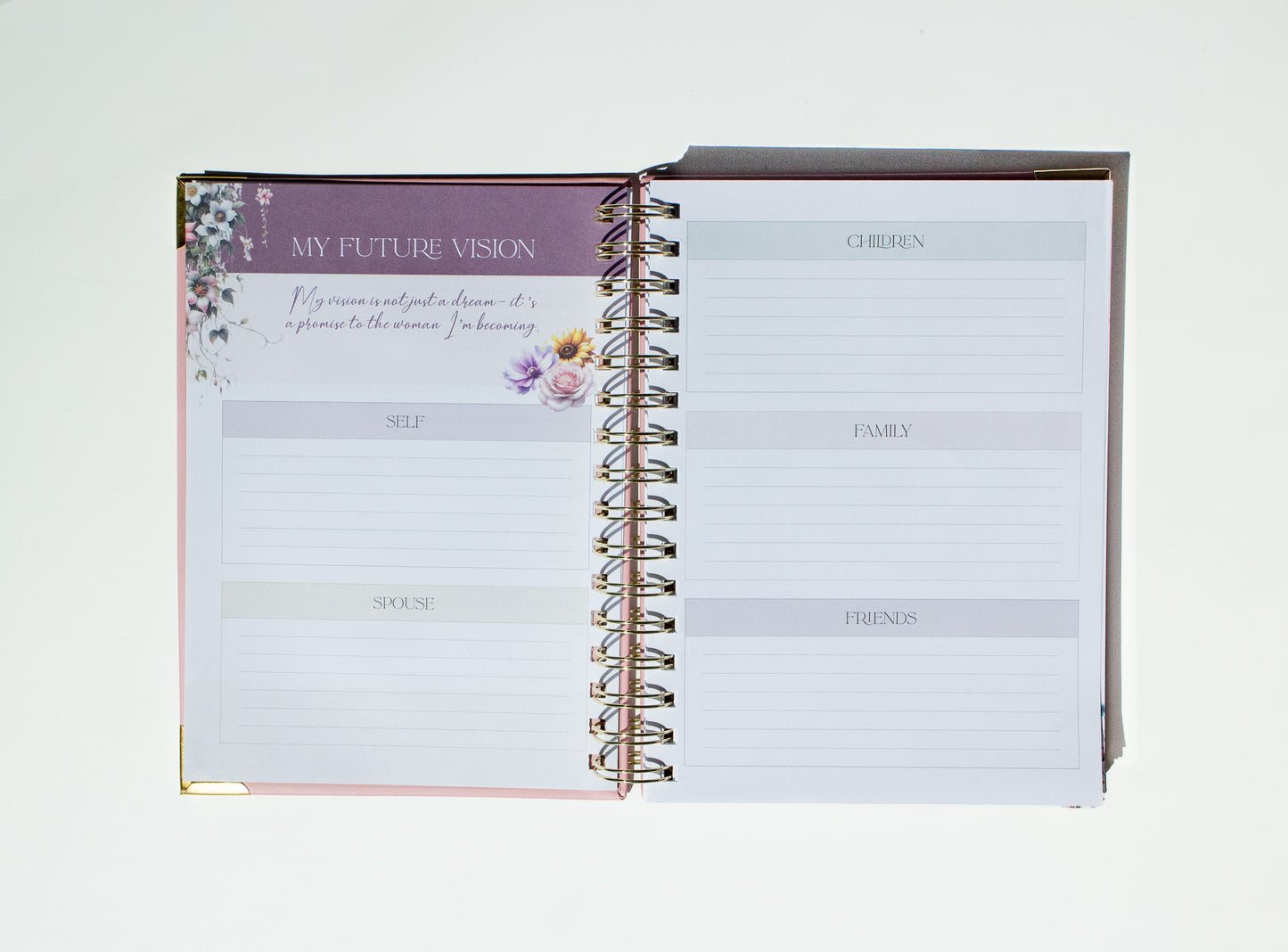 Open planner with vision and goals sections on a white background