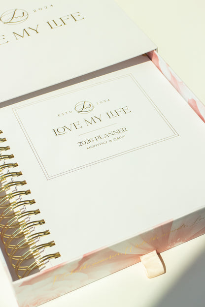 Planner with 'Love My Life' branding on a light background
